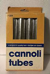 This Vintage Set of 4 Rowoco Cannoli Tubes model #1204 looks to have never been used. The pastry tubes are in their original box which has a recipe for Cannoli Shells and Filling on the back. The box shows signs of wear but is in GOOD condition.  Th