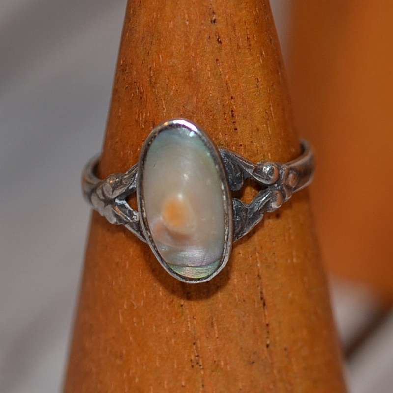 antique 925 sterling silver blister pearl ring: Can shine up with cleaning, but I prefer as is. Ring is tested solid sterling silver. Measures 5 on my ring sizer.