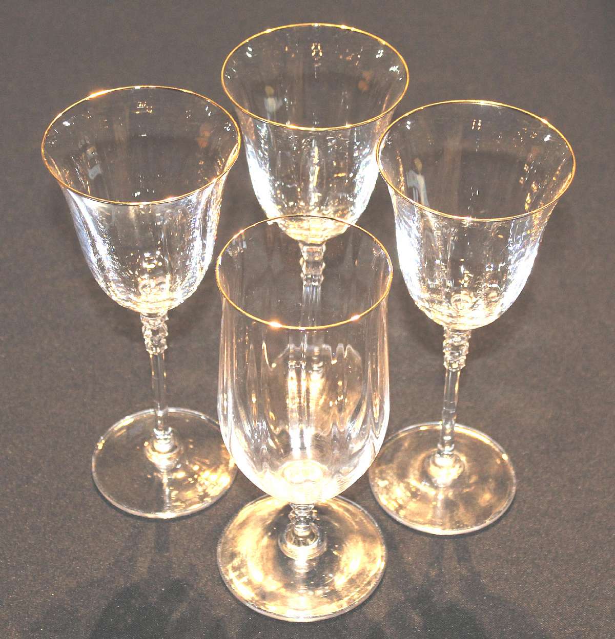 Up for sale are these Mikasa Sonata Gold Set Of Three Water Glasses & One Iced Tea Glass in excellent condition with no chips or cracks. The water glasses measure approx. 8 1/4"T by 3 1/2"W and the Iced Tea 7 3/8"T by 3"W.Shipping