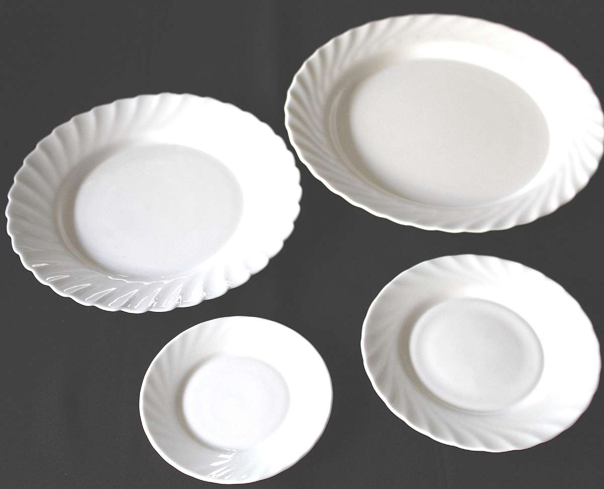 Up for sale are these Arcopal Trianon Chop Plate, Dinner Plate, Salad Plate & Bread Plate in excellent condition with no chips or cracks. The Chop Plate measures approx. 12 3/8"W, The dinnerplate 10 3/4"W, the Salad plate 7 3/4"W &
