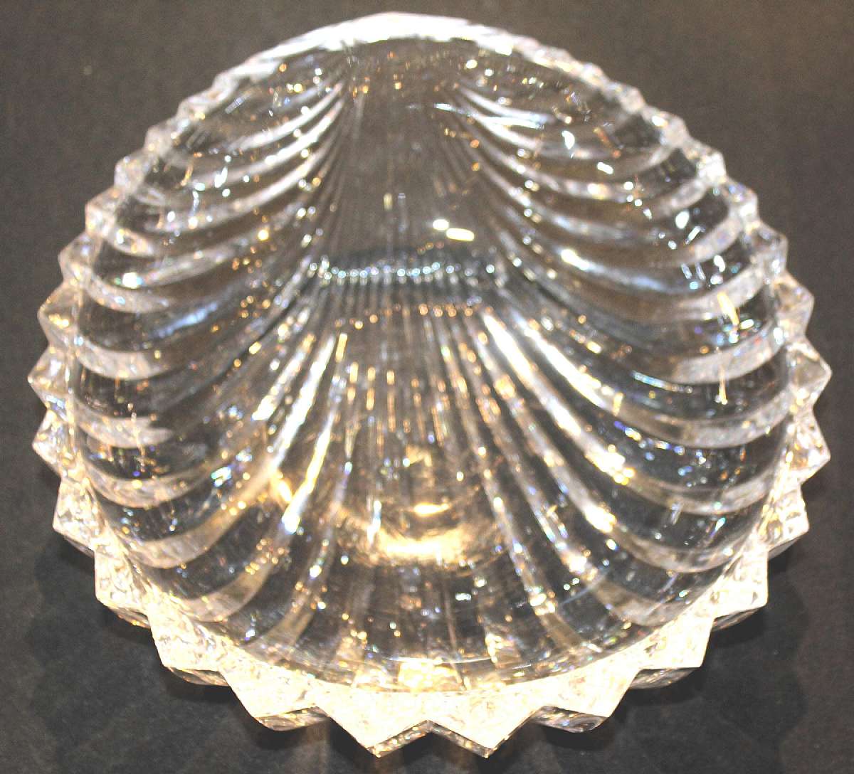 Up for sale is this Beautiful Crystal Clam Shaped Table Bowl in excellent condition with no chips or cracks. Measures approx. 11 3/4"L by 11 1/4"W by 4"D. Shipping Excludes: Alaska/Hawaii, US Protectorates, APO/FPO, PO BoxShipping Provide