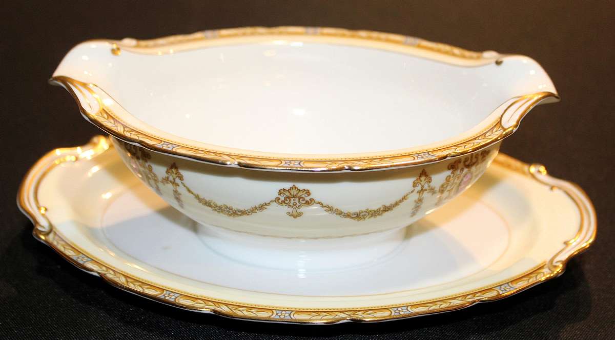 Up for sale is this Noritake Valdina 1933 Gravy Boat With Attached Under plate in excellent condition with no chips or cracks.  Shipping Excludes: Alaska/Hawaii, US Protectorates, APO/FPO, PO BoxShipping Provided to the United States Only.