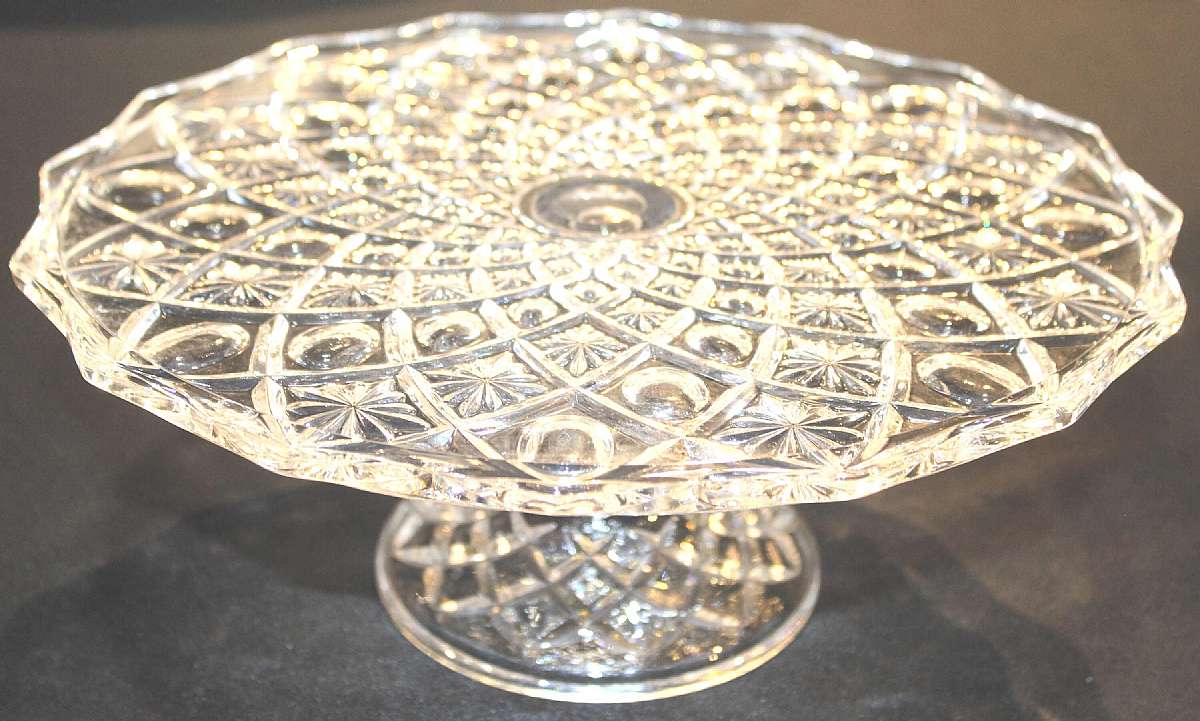 Up for sale is this Beautiful Highly Decorated Glass Cake Plate in excellent condition with no chips or cracks. It measures approx. 12"W by 4 3/4"T.  Shipping Excludes: Alaska/Hawaii, US Protectorates, APO/FPO, PO BoxShipping Provided to the U