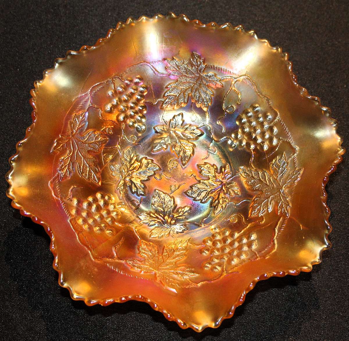 Up for sale is this Antique Northwood Grape & Cable Marigold Bowl. It measures approx. 8 3/4 inches wide and is in excellent condition with no chips or cracks.Shipping Excludes: Alaska/Hawaii, US Protectorates, APO/FPO, PO BoxShipping Provided to th