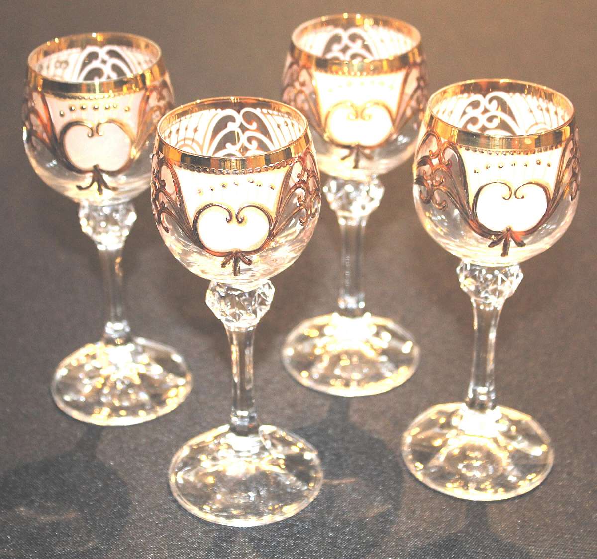 Up for sale are these four Gorgeous Vintage gold Filigree Crystal Cordial Glasses With A Heart in excellent condition with no chips or cracks. They measure approx. 5 1/4"T by 1 7/8"W.  Minor gold wear. Shipping Excludes: Alaska/Hawaii, US Prote