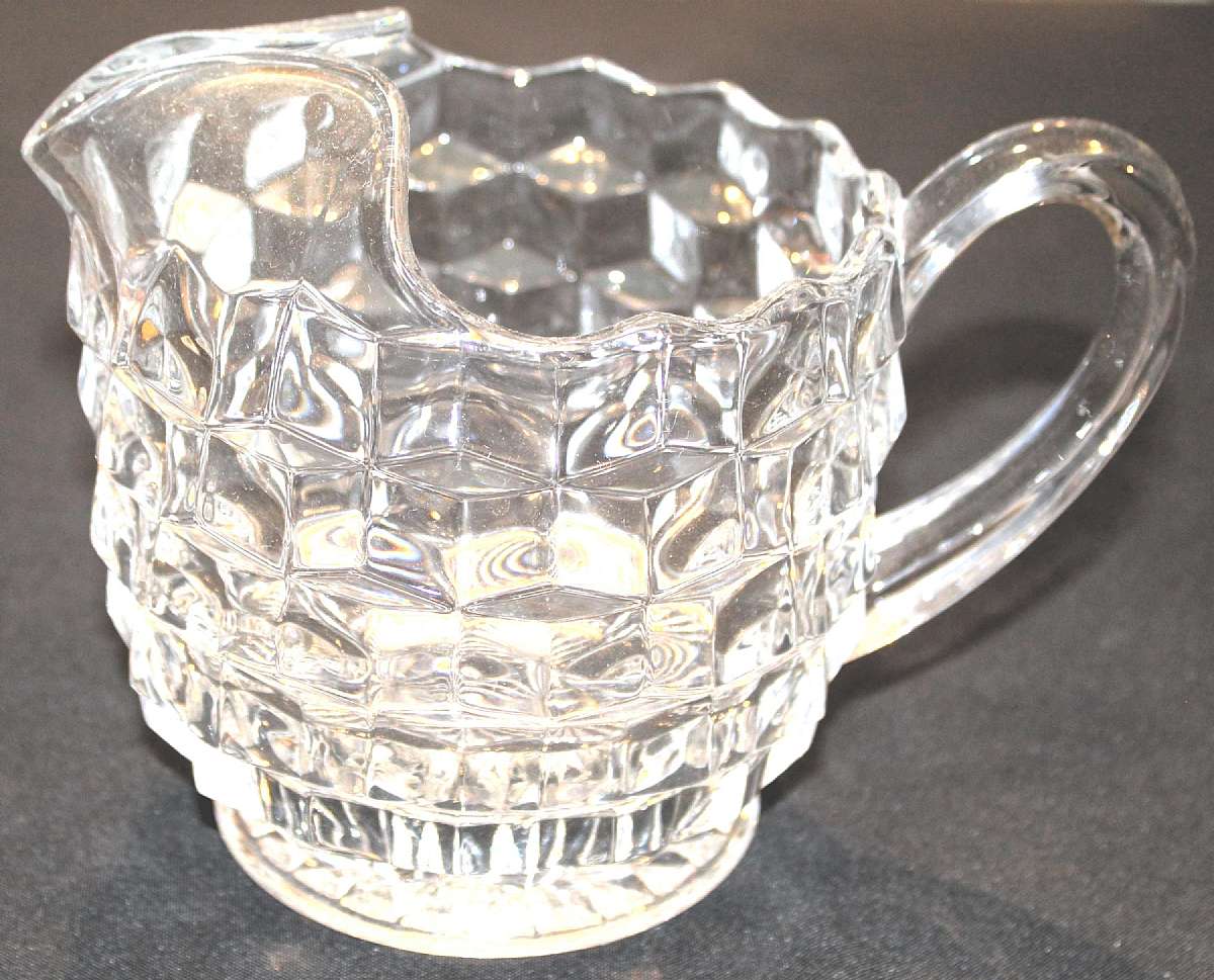 Up for sale is this Fostoria American Ice Lip 48 Ounce Jug Pitcher. It measures approx. 6"T and is excellent condition with no chips or cracks.  Shipping Excludes: Alaska/Hawaii, US Protectorates, APO/FPO, PO BoxShipping Provided to the United Stat