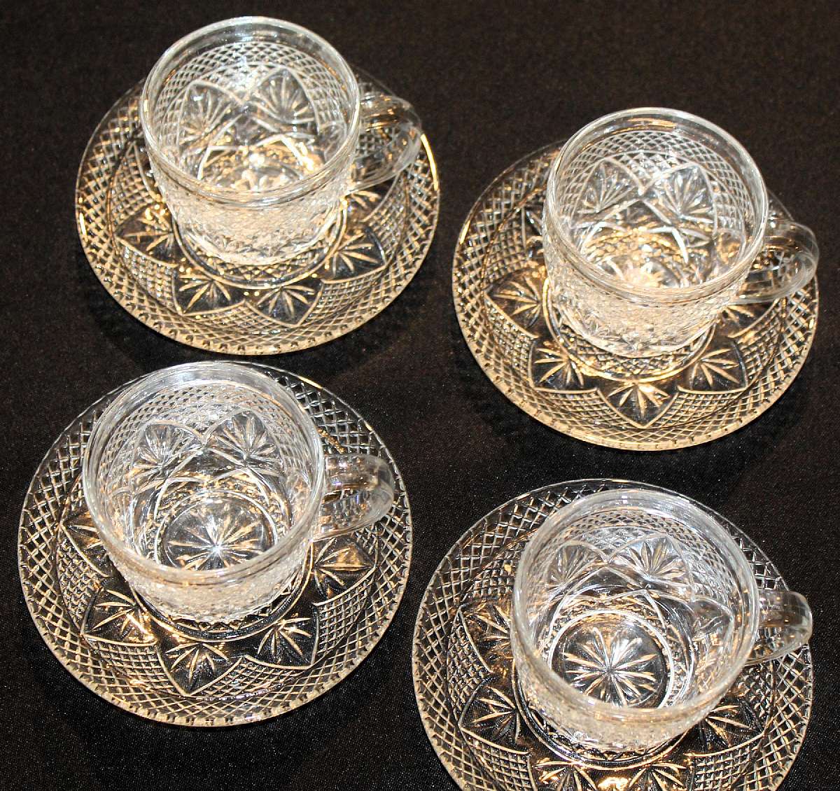 Up for sale are these Cristal Dâ€™Arques Durand Antique Clear Set Of Four Cup & Saucer Sets in Outstanding excellent condition with no chips or cracks. The cups measure approx. 3"T by 3"W and the saucer 5 1/2"W. Shippi