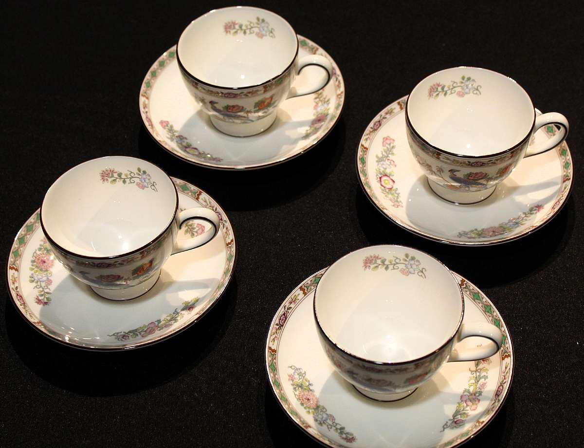 Up for sale are These Wedgwood Kutani Crane Set Of Four Footed Cup & Saucer Sets in excellent condition with no chips or cracks. The Cups Measure approx. 2 3/4"T by 3 1/4"W & the saucers are 5 3/4"W.Shipping Excludes: Alaska/Hawaii
