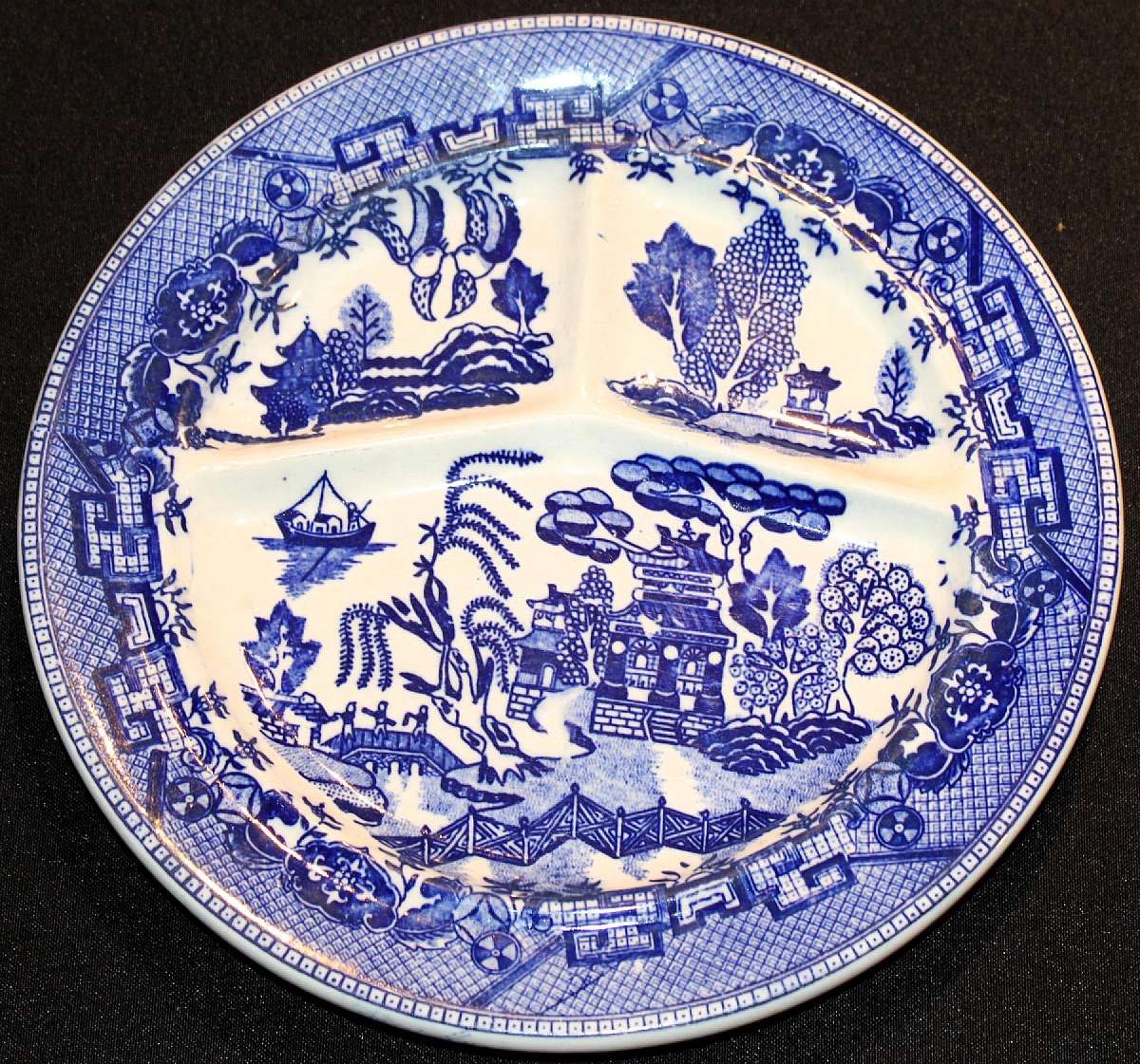 Up for sale is this Rare Vintage Moriyama Blue Willow Grill Plate. There are no cracks. Bottom rim has a chip pictured. Measures approx. 10 1/4"W.Shipping Excludes: Alaska/Hawaii, US Protectorates, APO/FPO, PO Box Shipping Provided to the United St
