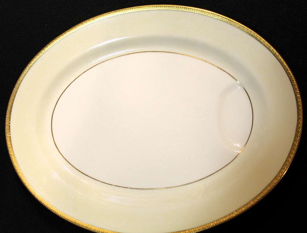 Up for sale is this Theodore Haviland Milford Eleven Inch Platter in great condition with no chips or cracks. Circa 1951. Measures approx. 11 1/2"L by 9 1/8"W. Some utensil marks from use. Please see my other sales for more of this pattern. Shi