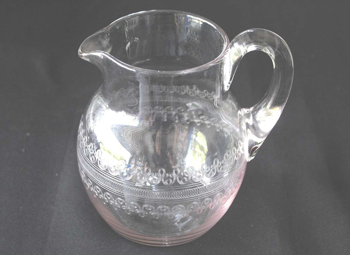 Up for sale is this Large Cloverleaf Design Two Quart Pitcher in excellent condition with no chips or cracks. This could be Fostoria or Tiffin but I.m not sure. Thia holds approx. 2 quarts and measures approx. 7"T measuring from the spout to table. It has