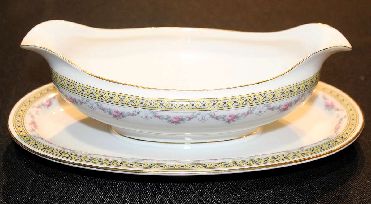 Up for sale is this Antique Lorenz Hutschenreuther Selb Bavaria Pattern HUT1737 Gravy Boat with attached underplate. It measures approx. 9" long. Please see my other sales for more of this beautiful pattern.Shipping Excludes: Alaska/Hawaii, US Prote