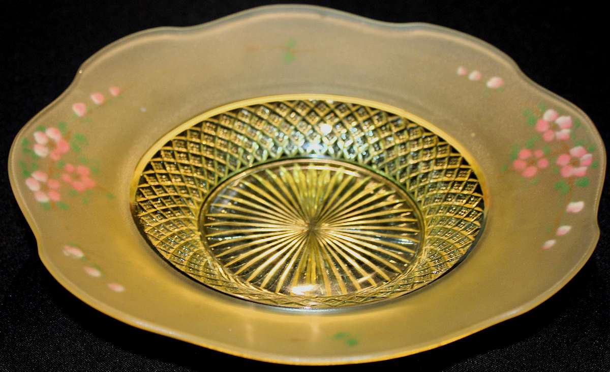 Up for sale is this Vintage Beautiful Glass Ruffled Edged Yellow Floral Bowl in excellent condition with no chips or cracks. The bowl measures approx. 10 3/4 inches wide at its widest point and about 2 1/4 inches tall. Shipping Excludes: Alaska/Hawaii, U