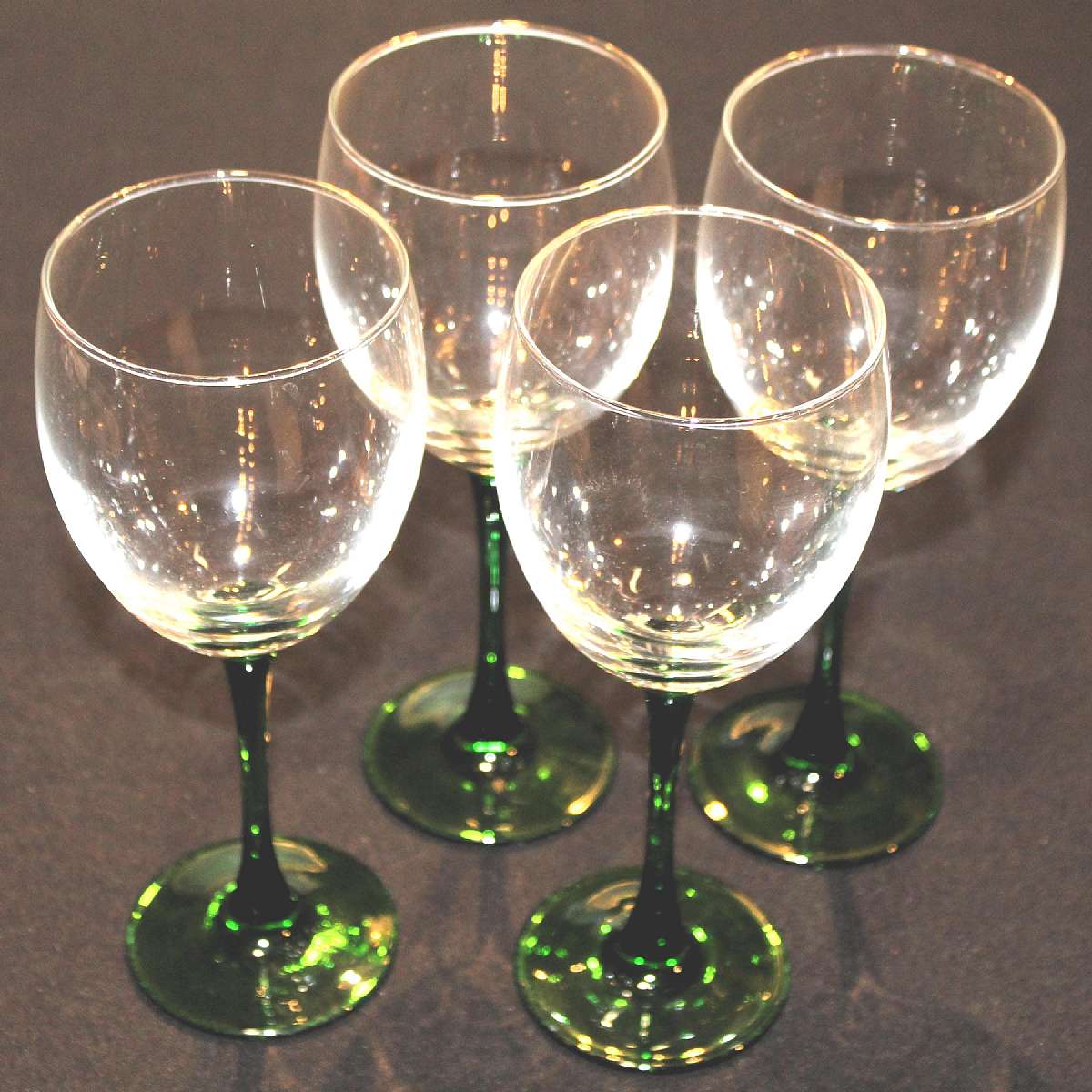 Up for sale are these Beautiful Vintage Luminarc France Set Of Four Green Stemmed Wine Goblets. They are in excellent condition with no chips or cracks. They measure approx. 8"T by 3"W.   Shipping Excludes: Alaska/Hawaii, US Protectorates, APO/