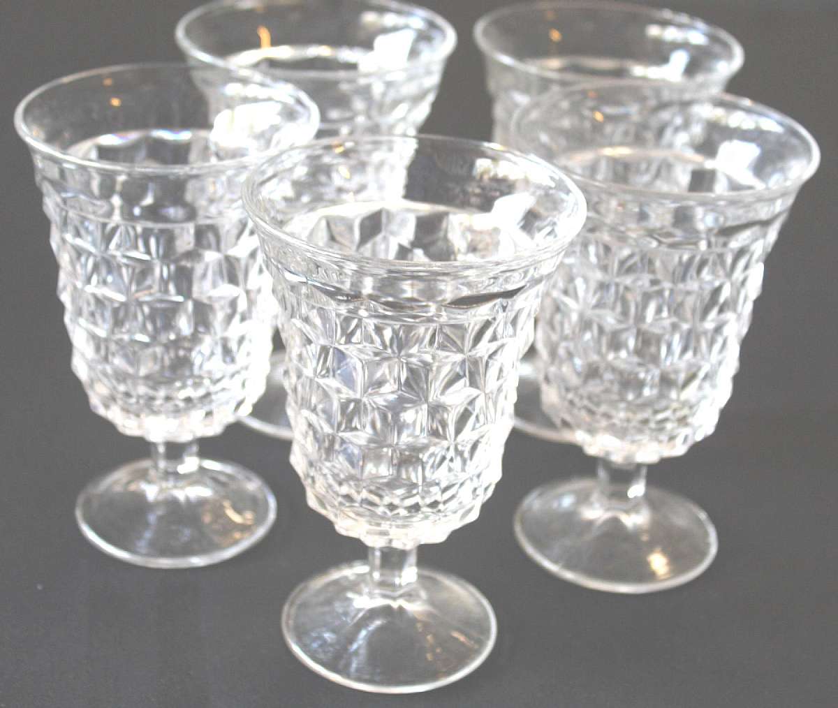 Up for sale are these Fostoria American Set Of Five Low Water Goblets in excellent condition with no chips or cracks. They measure approx. 5 1/2"T by 3 1/2"W.Shipping Excludes: Alaska/Hawaii, US Protectorates, APO/FPO, PO BoxShipping Provided