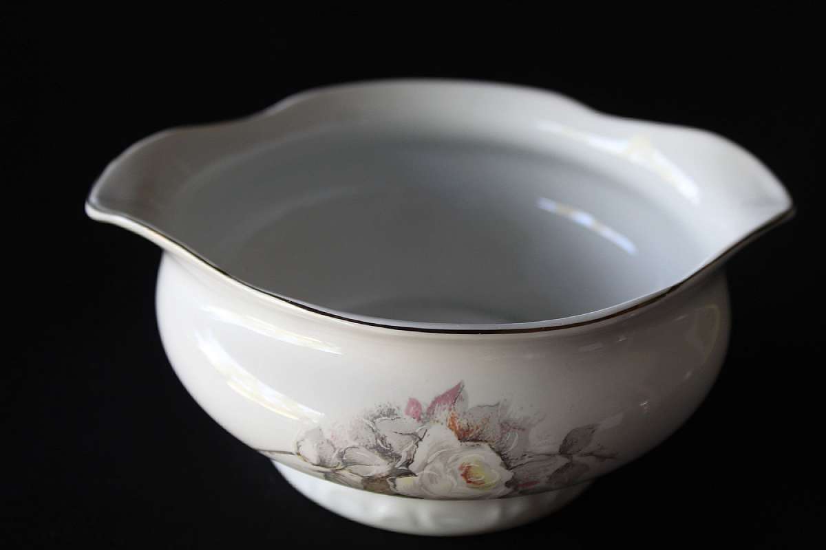 Up for sale is this Schmidt Porcelain White Rose Gravy Boat in excellent condition with no chips or cracks. The silver rim probably platinum is excellent as well. It measures approx. 6 5/8"W by 2 7/8"D. Shipping Excludes: Alaska/Hawaii, US Prot