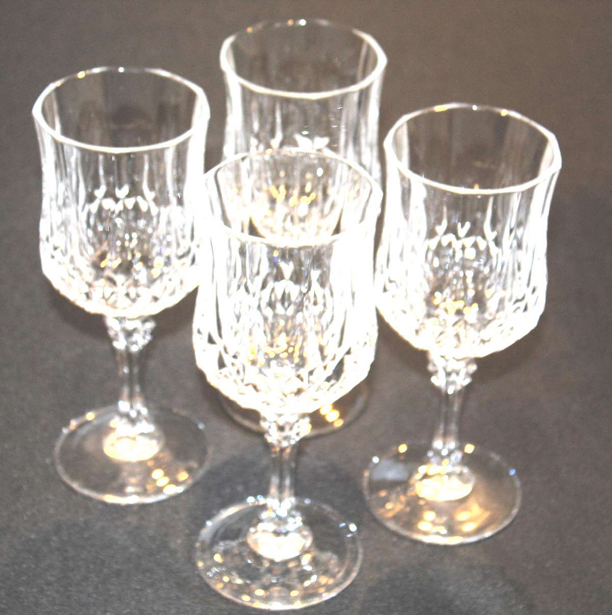 Up for sale are these Cristal D'Arques Longchamp Set of Four Water Glasses in excellent condition with no chips or cracks. They measure approx. 7 1/4"T by 2 3/4"W. Shipping Excludes: Alaska/Hawaii, US Protectorates, APO/FPO, PO BoxShipping Pro