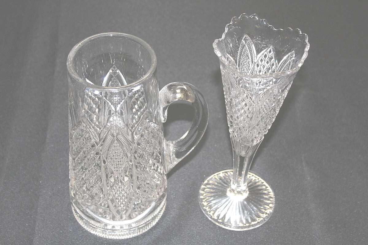 Up for sale are these Antique Duncan & Miller Scalloped Six Point Vase and Matching Handled Piece in excellent condition with no chips or cracks. The handled piece measures approx. 9 1/2""T by 3 5/8"W at the top and 4 3/4"W at the