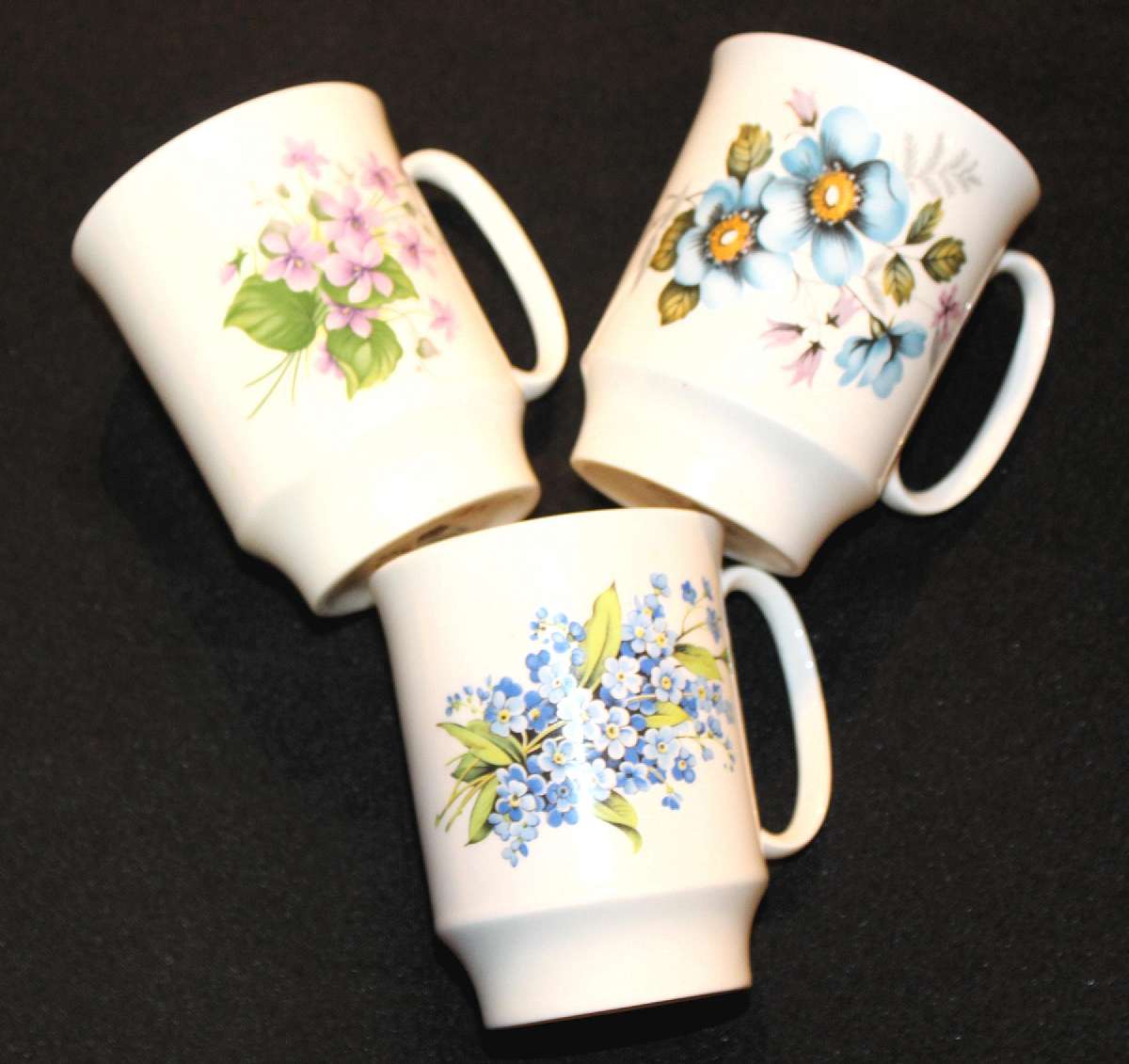 Up for sale are these Royal Windsor Bone China England Set Of Three Mugs in great condition with no chips or  cracks. Measure approx. 3 3/4 inches tall by 2 7/8 inches wide.Shipping Excludes: Alaska/Hawaii, US Protectorates, APO/FPO, PO BoxShipping Prov