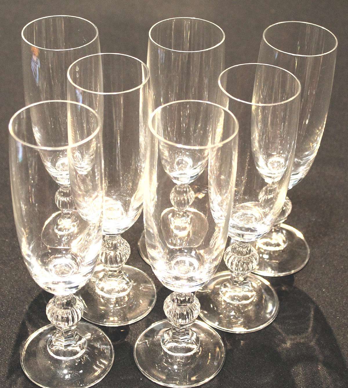 Up for sale are these American Cut Iris Set Of Seven Fluted Champagne Glasses in excellent condition with no chips or cracks. They measure approx. 7 3/8"T.Shipping Excludes: Alaska/Hawaii, US Protectorates, APO/FPO, PO BoxShipping Provided to the U