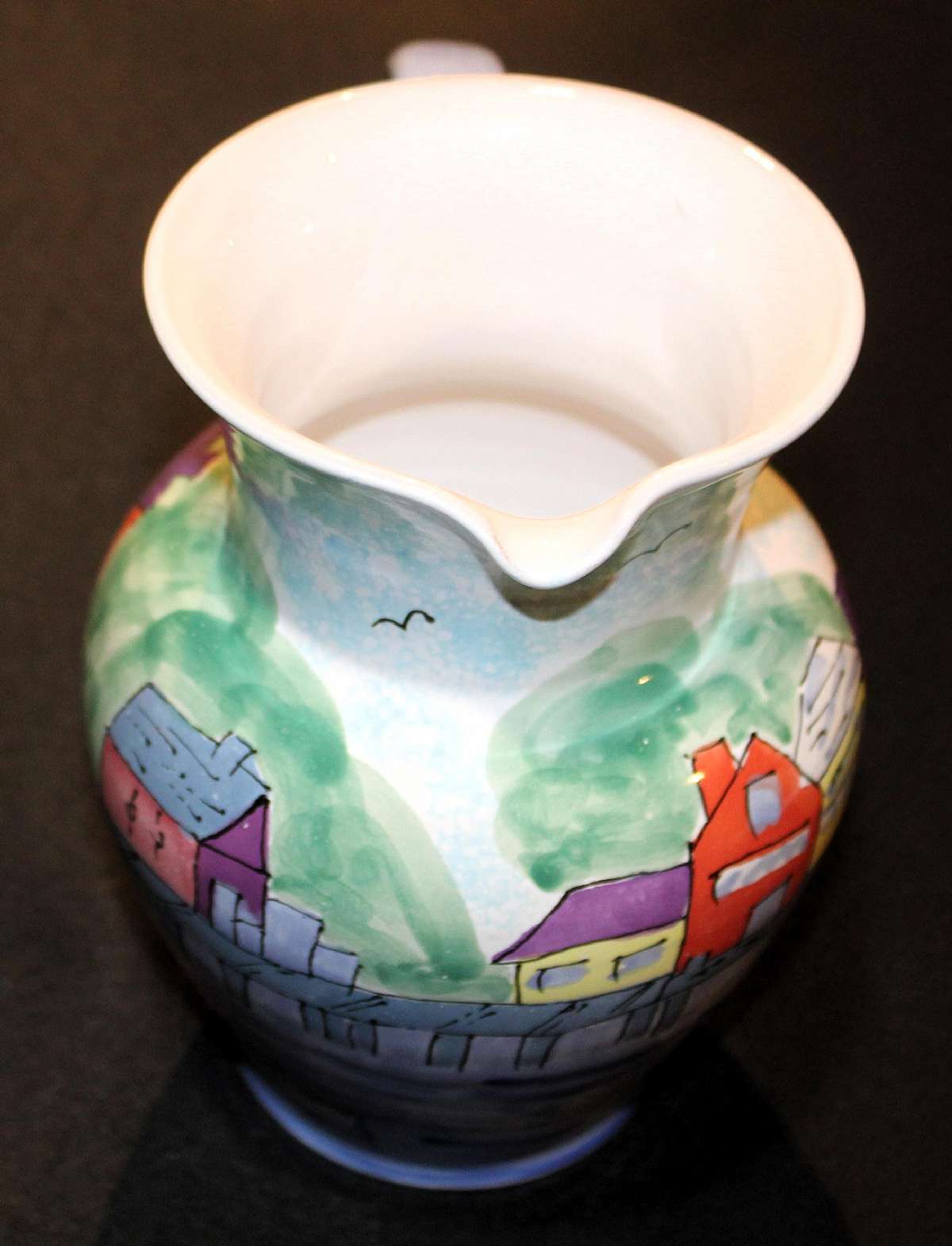 Up for sale is this hard-to-find 2.5-quart pitcher in the "Maritime" pattern by Mesa International. The made in Hungary pitcher measures approximately 4.5" in top diameter by 8" tall and weighs 2.6 lbs.  The pitcher is hand painted and has a coastal scene