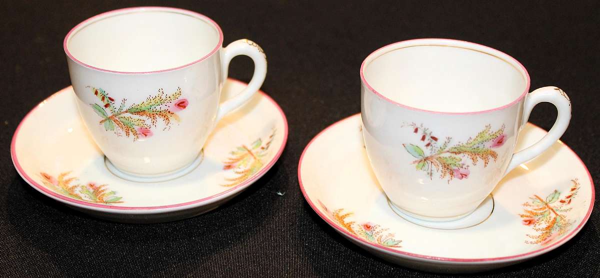Up for sale are these Moss Rose Antique Set Of Two Cups and Saucers, Smooth Pink with Trim Gold Line Cups and Saucers. The cups measure approx. 2 1/4"T & 2 1/2"W. The saucers measure approx. 4 5/8"W. Shipping Excludes: Alaska/Hawaii, U