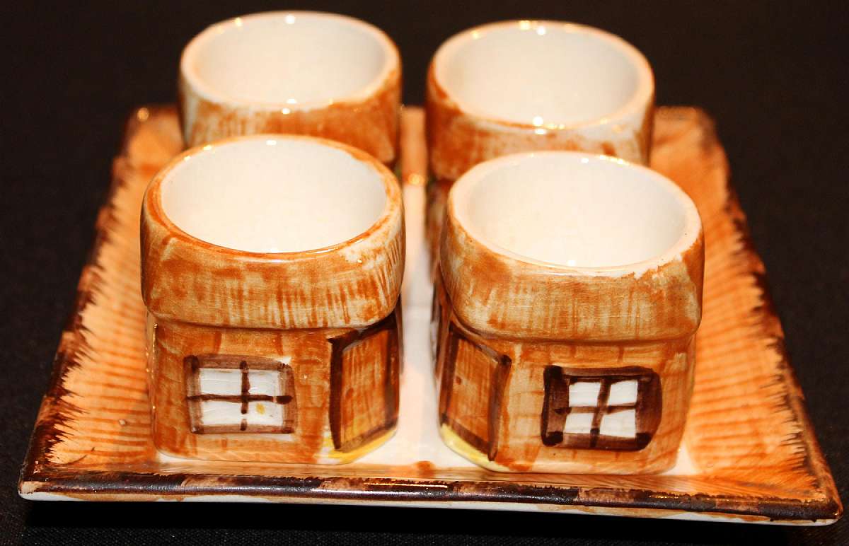 Up for sale is this Price Kensington Ye Olde Cottage Egg Cup Set. The tray is 6"W. The four egg cups measure approx. 2"T. There are no chips. There is some crazing.Shipping Excludes: Alaska/Hawaii, US Protectorates, APO/FPO, PO BoxShipping Pro