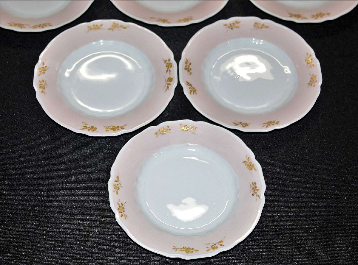 Up for sale are these Hermann Ohme Carmen Set Of Six Antique Plates in great condition with no chips or cracks and minor gold wear. The plates measure approx. 6 1/8"W.  Porzellanfabrik Hermann Ohme was established in 1882 in Nieder-Salzbrunn (today Polish