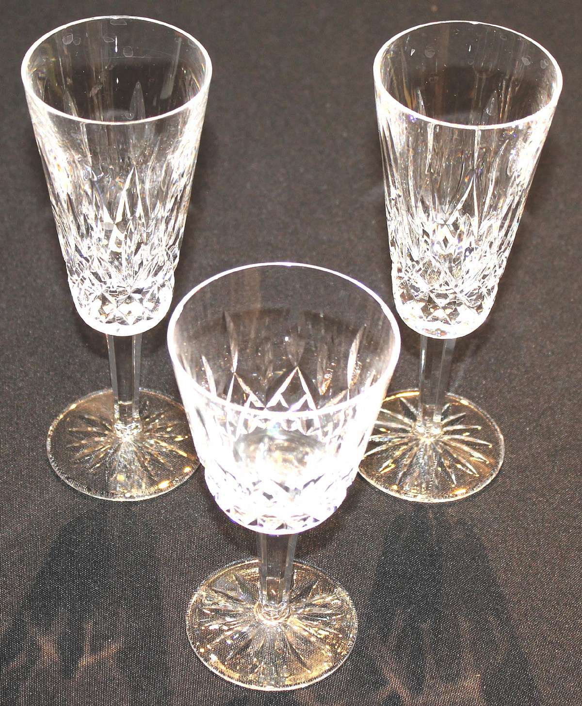 Up for sale are these Waterford Lismore Set Of One Claret Wine Glass & Two Champagne Glasses in excellent condition with no chips or cracks. The Wine Glass measures approx. 5 3/4"T by 3"W and the two Champagne Glasses 7 1/4"T by 2 1/2&q