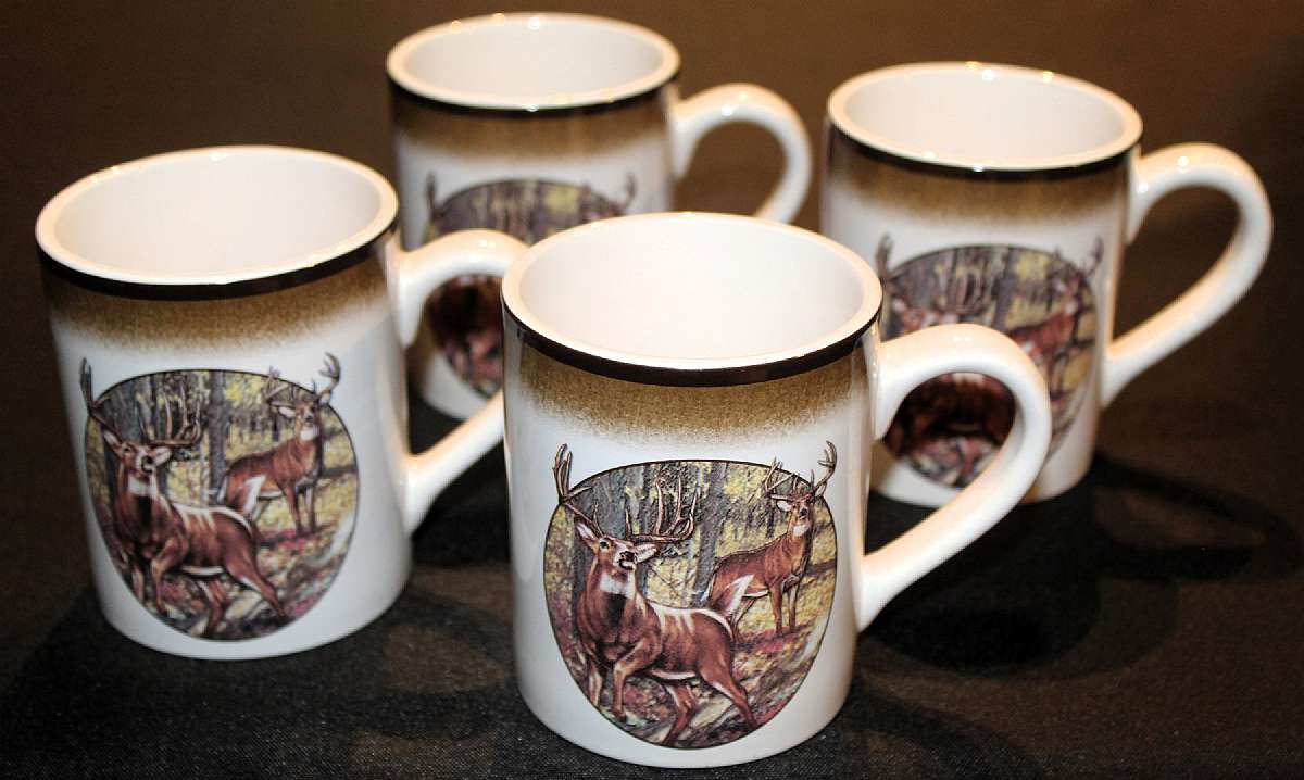 Up for sale are these Rare Great Ideas LLC Buck Wear Deer Set Of Four Mugs in excellent condition with no chips. The mugs measure approx. 4"T by 3 5/8"W.  Shipping Excludes: Alaska/Hawaii, US Protectorates, APO/FPO, PO BoxShipping Provided to