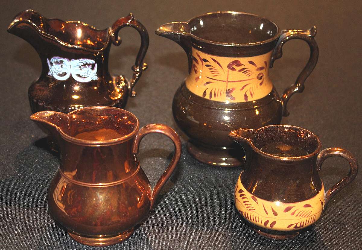 Up for sale are these Antique Copper Luster 1820-1850 Set Of Four Pitchers  in great condition.  One measures approx. 4 5/8"T, one is 4 3/8"T, one is 3 5/8"T and one is 3"T.  Copper Luster is a metallic Luster on pottery obtained by fi