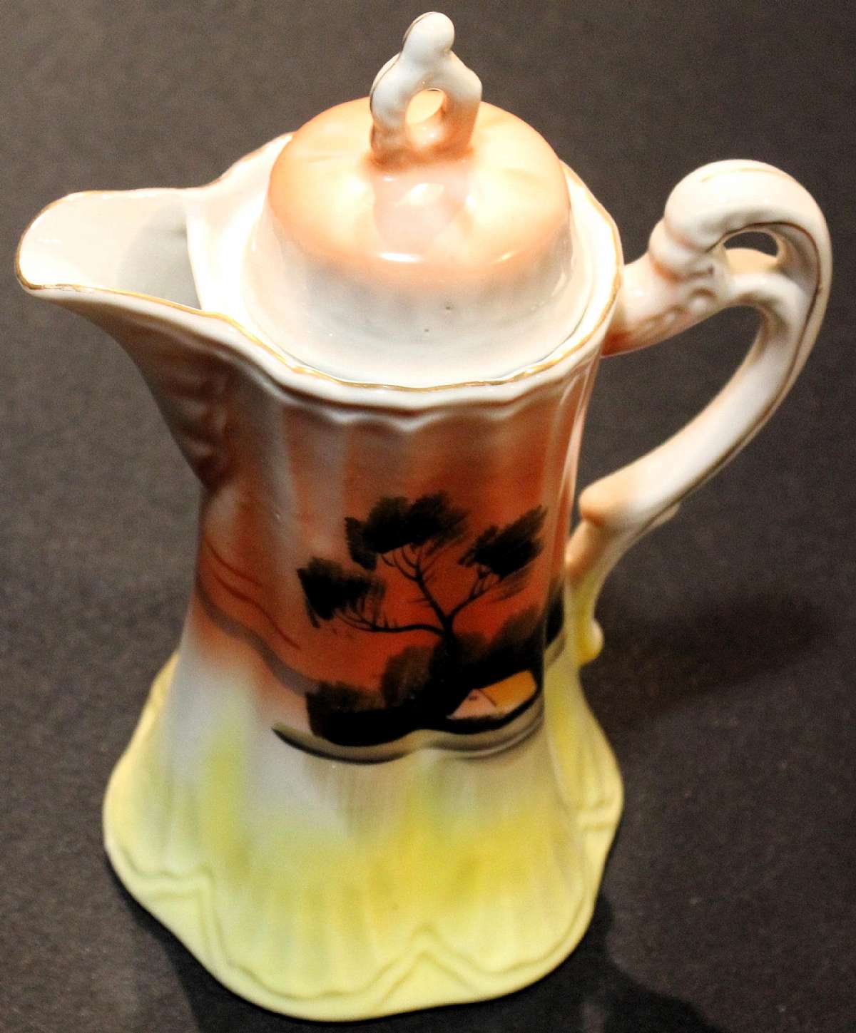 Up for sale is this Antique Takito Company Chocolate Pot. The Takito Company was in business from 1880 to 1948. This set was made circa 1920's.  The chocolate pot measures approx. 7 1/2"T. Some minor gold wear and a small nick under the lid that is s