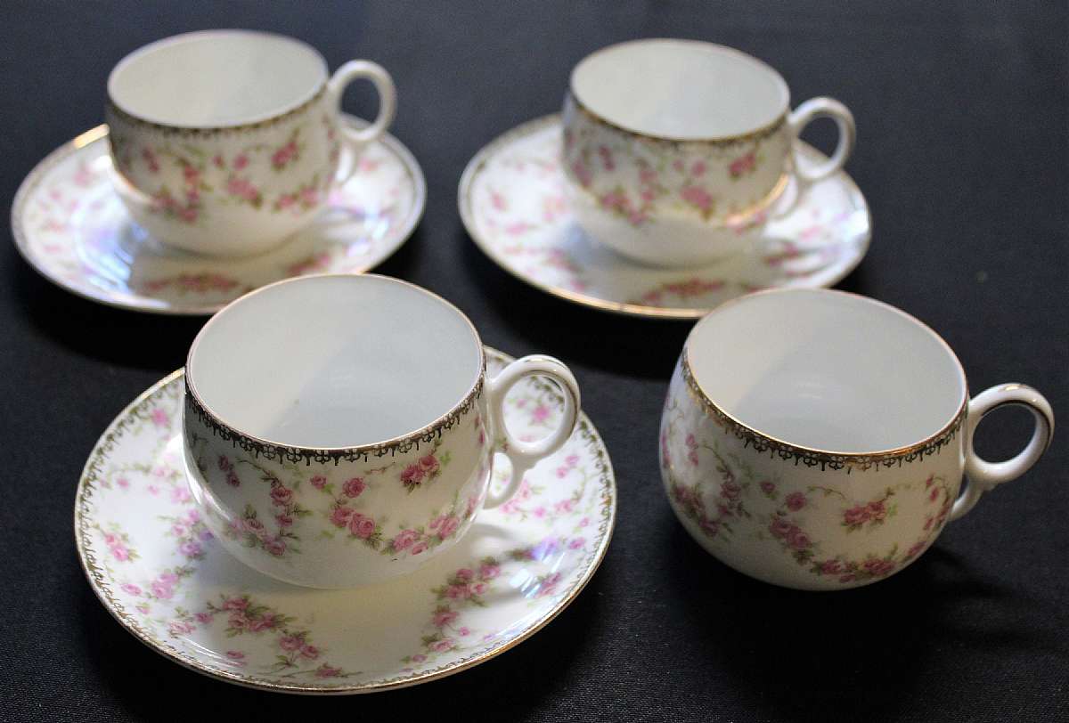 Up for sale are these Altrohlou Bridal Rose Set Of Four Cups & Three Saucers in great condition with no chips or cracks and minor wear on the design. The cups measure approx. 2 1/4"T by 2 7/8"W and the saucers are about 5 7/8"W. Shippi