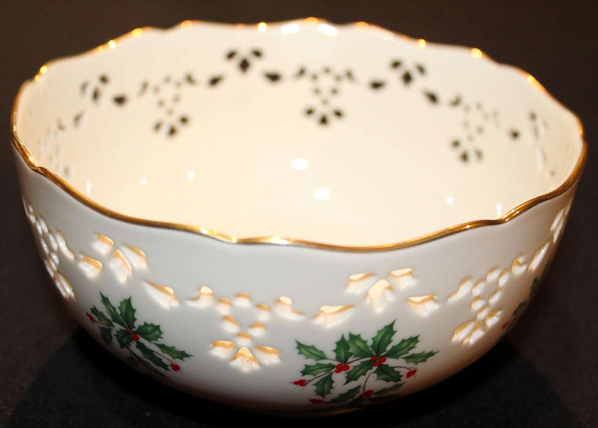 Up for sale is this Lenox Holiday Dimension Pierced All Purpose Bowl in excellent condition with no chips or cracks. The bowl measures approx. 6"W by 3"D. Shipping Excludes: Alaska/Hawaii, US Protectorates, APO/FPO, PO BoxShipping Provided to