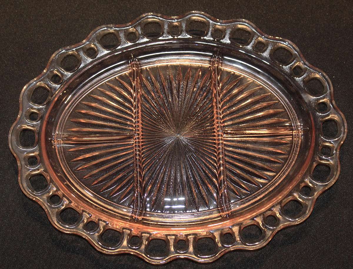 Up for sale is this Elegant Anchor Hocking Lace Edge Pink Depression Oval Five Part Relish in excellent condition with no chips or cracks. It measures approx. 12 3/4 inches long & about 9 1/2 inches wide.Shipping Excludes: Alaska/Hawaii, US Protector