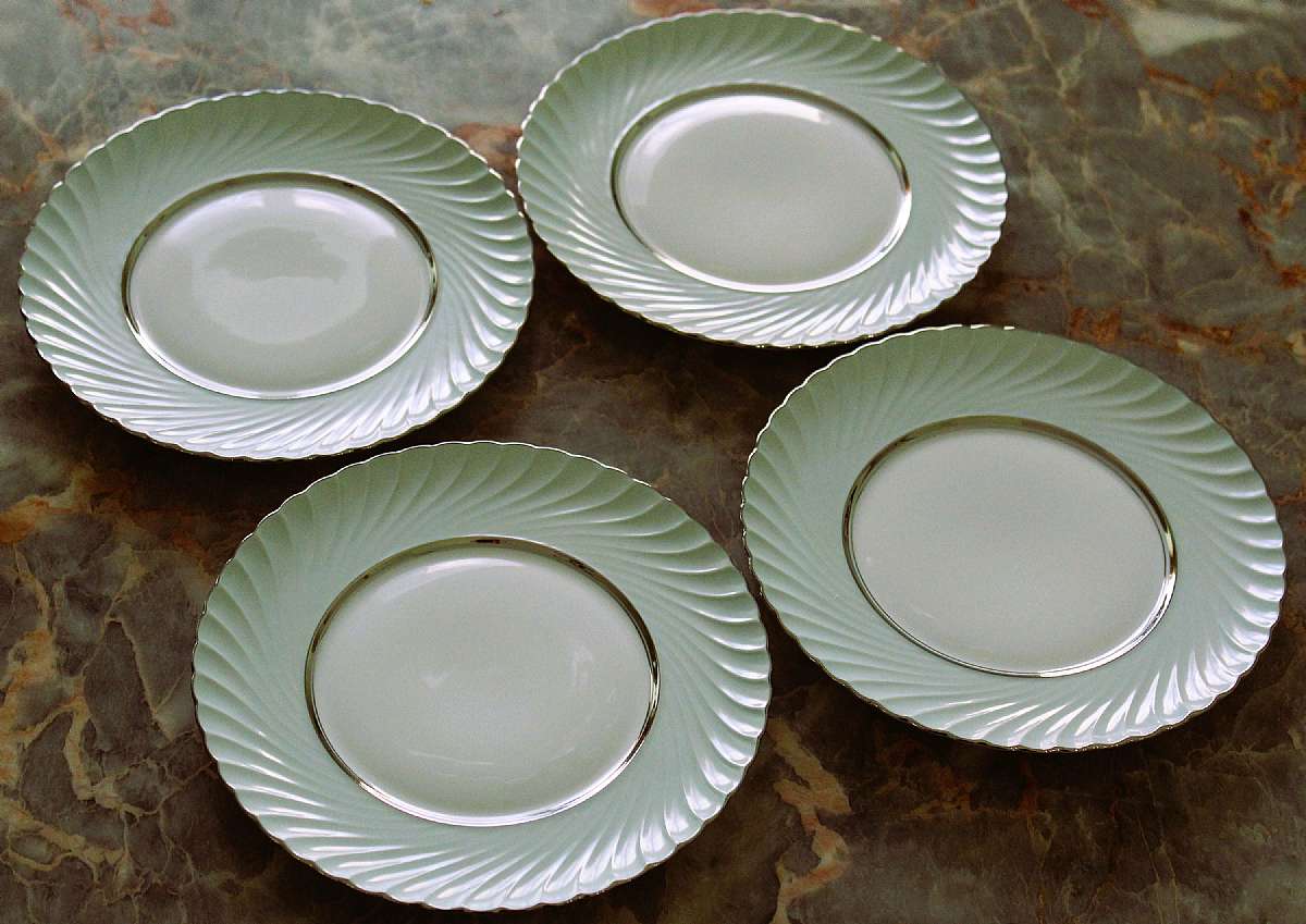 Up for sale are these Rare Royal Tettau South Wind Grey Green Set Of Four Salad Plates in excellent condition with no chips or cracks. They measure approx. 7 3/4"W.  Please see my other sales for more of this beautiful pattern.Shipping Excludes: Ala