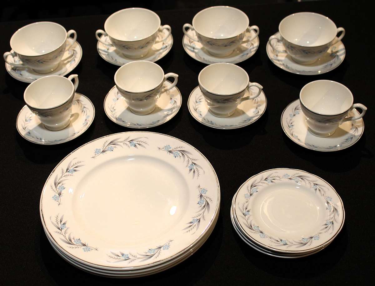 Up for sale is this Mayfair England Bone China 24 Piece Dinnerware Set For Four in excellent condition with no chips or cracks. Included are Four 10 3/4" Dinner Plates, Four 6 1/2" Bread Plates, Four 6" Soup Saucers, Four 2 1/2"T by 4 1/4"W Handled Soup B