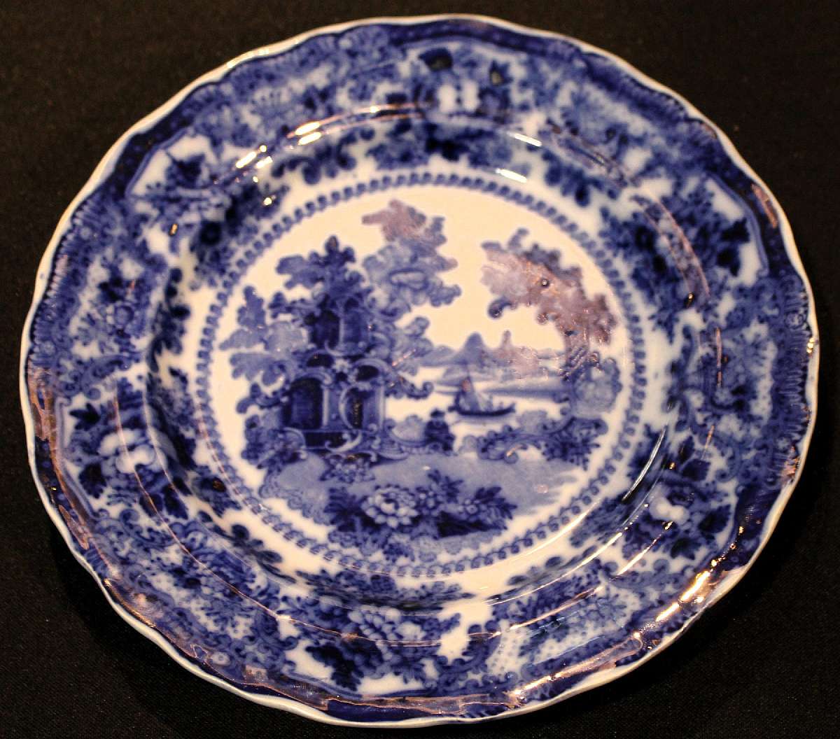 Up for sale is this Antique Adams Fairy Villas Flow Blue Lunch Plate. It measures approx. 9"W. In great condition with no chips or cracks. Manufacturers defect pictured. Circa 1870.Shipping Excludes: Alaska/Hawaii, US Protectorates, APO/FPO, PO Box