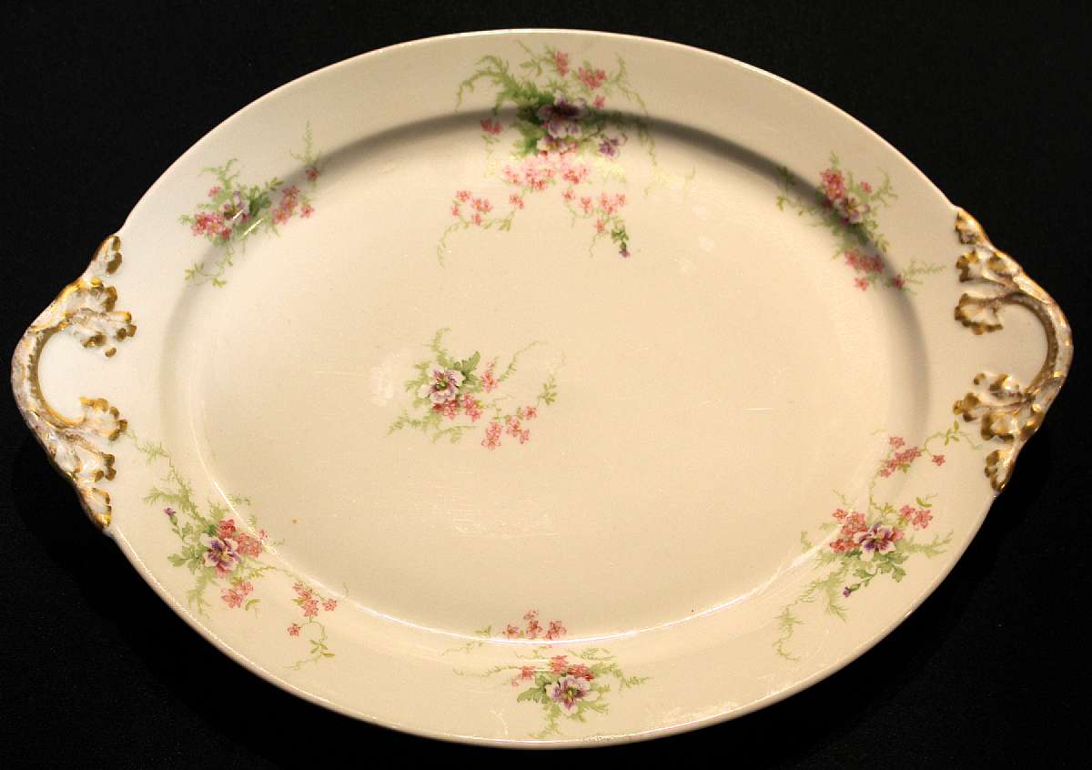 Up for sale are these Wm Guerin Pattern 52 Limoges France Antique Oval 13 Inch Platter in excellent condition with no chips or cracks. The Platter measure approx. 13 3/4"L by 10 1/8"W. Please see my other sales for more of this beautiful pattern