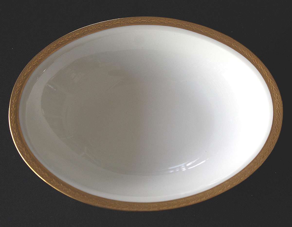 Up for sale is this Hutschenreuther Gold Laurel Design Serving Bowl in excellent condition with no chips or cracks. It measures approx. 10 1/8" by 7 3/4" by 2" Deep. Shipping Excludes: Alaska/Hawaii, US Protectorates, APO/FPO, PO BoxShipp