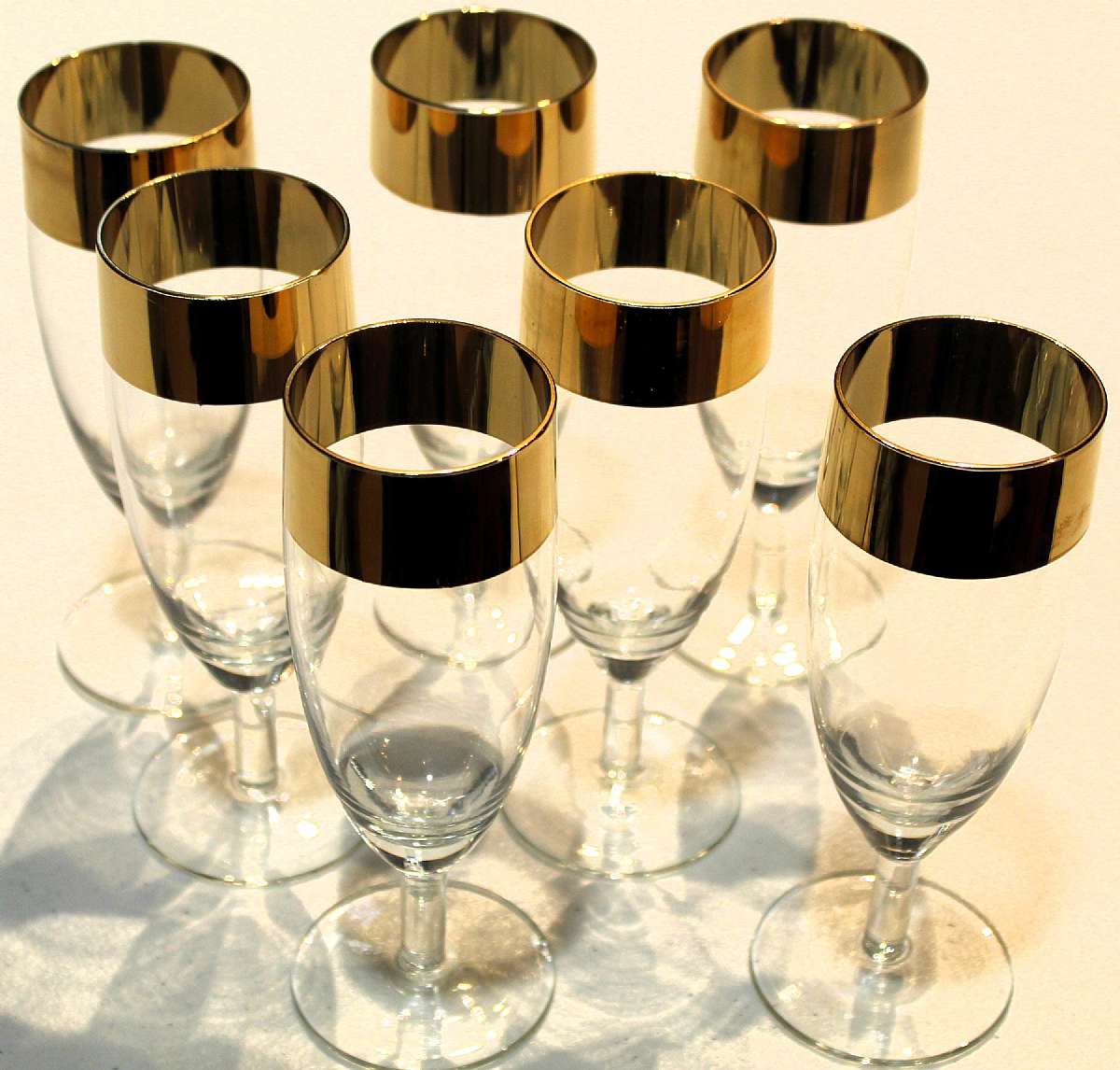 Up for sale are these Avitra Golden Set Of Seven Whiskey Sour Glasses in great condition with no chips or cracks. They measure approx. 5 7/8"T by 1 7/8"W.   Shipping Excludes: Alaska/Hawaii, US Protectorates, APO/FPO, PO BoxShipping Provided t