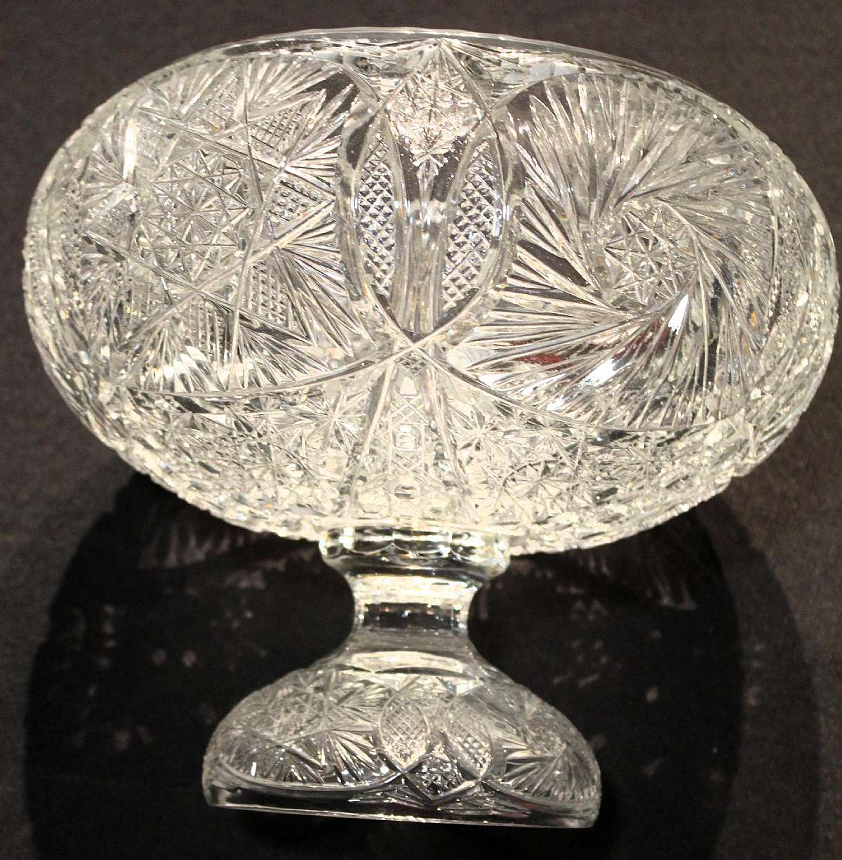 Up for sale is this Beautiful Antique ABP American Brilliant Cut Glass Punch Bowl. The punch bowl measures approx. 9 1/2"T by 11"W at its widest and 7"W at the opening. This does have some flea bites/small chips on the bottom rim only. Beau