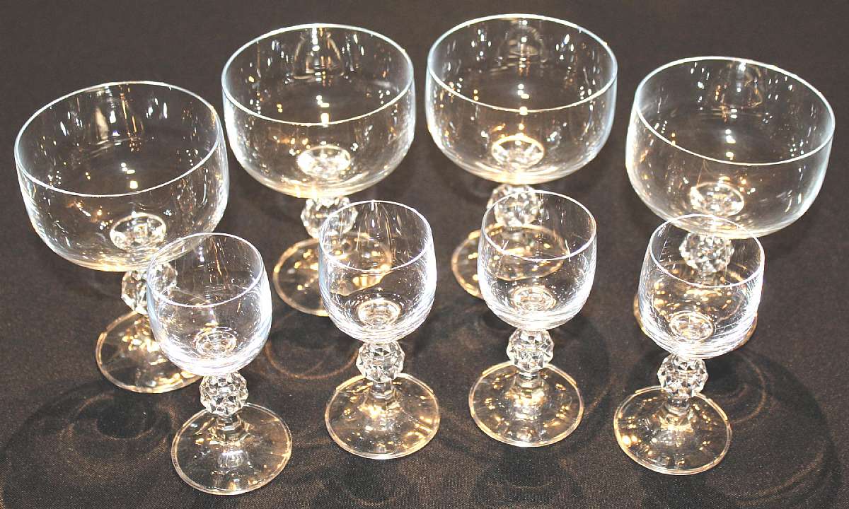 Up for sale are these Import Associates Claudia Set Of Four 4 3/8"T Cordials & Four 5"T Champagne Glasses in excellent condition with no chips or cracks. Shipping Excludes: Alaska/Hawaii, US Protectorates, APO/FPO, PO BoxShipping Provided