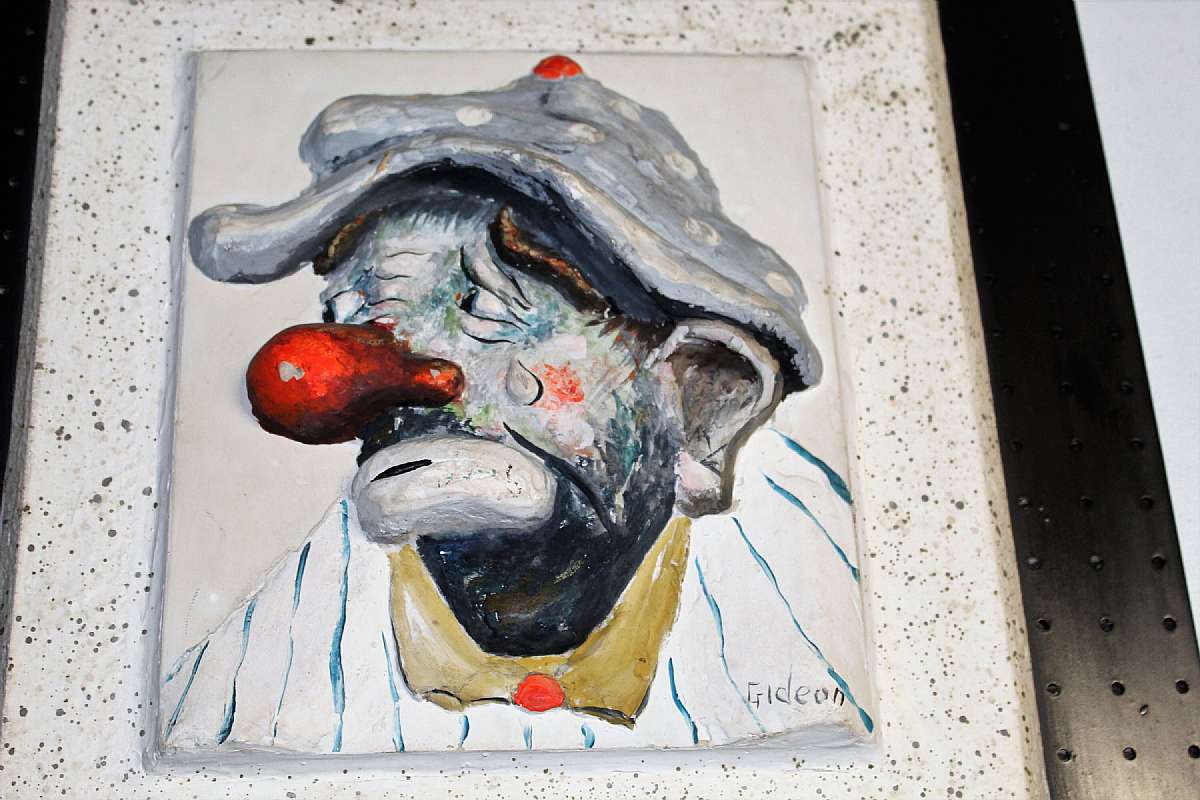 Up for sale is this Rare Gideon Original Artist Relief Wall Sculpture Plaque of Sad Clown Emmett Kelly. The entire piece of art with the frame measures approx. 21 by 23 inches. The art itself which could be plaster but I'm not sure and measures approx. 17