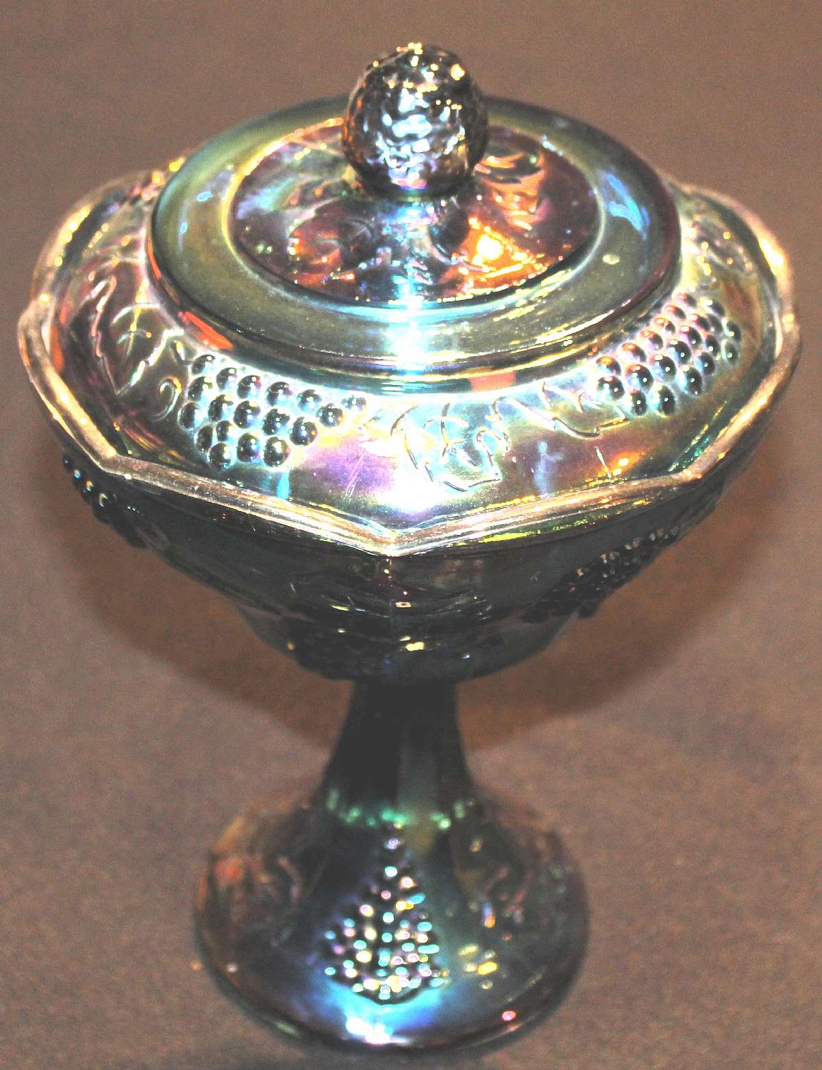 Up for sale is this Colony Carnival Blue Wedding Bowl With Lid. The bowl measures approx. 10 1/4 " Tall by 6 3/4 inches wide and is in excellent condition with no chips or cracks. Shipping Excludes: Alaska/Hawaii, US Protectorates, APO/FPO, PO BoxS