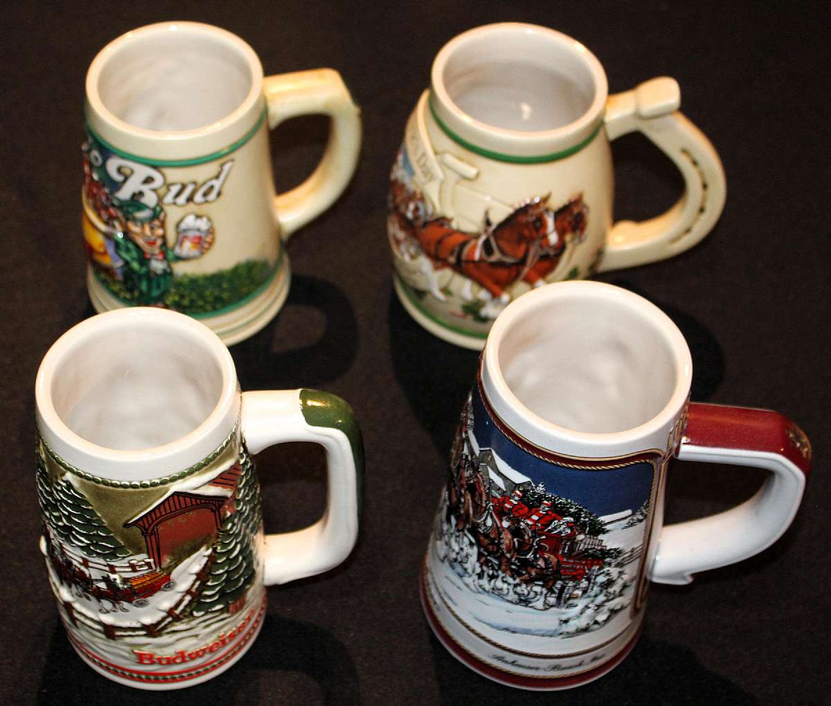 Up for sale are these Budweiser Set Of Four Stein Mugs in excellent condition with no chips or cracks.  Shipping Excludes: Alaska/Hawaii, US Protectorates, APO/FPO, PO BoxShipping Provided to the United States Only.