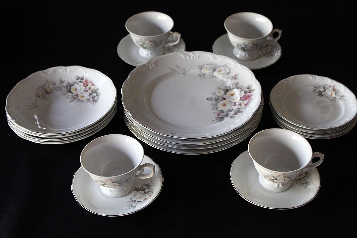 Up for sale is this Schmidt Porcelain White Rose 20 Piece Service For Four. Included are Four 9 7/8"W Dinner Plates, Four 6"W Bread Plates, Four 7 3/4" by 1 3/8"T Soup or Salad Bowls & Four 2 5/8"T by 3 3/4"W Cups & F