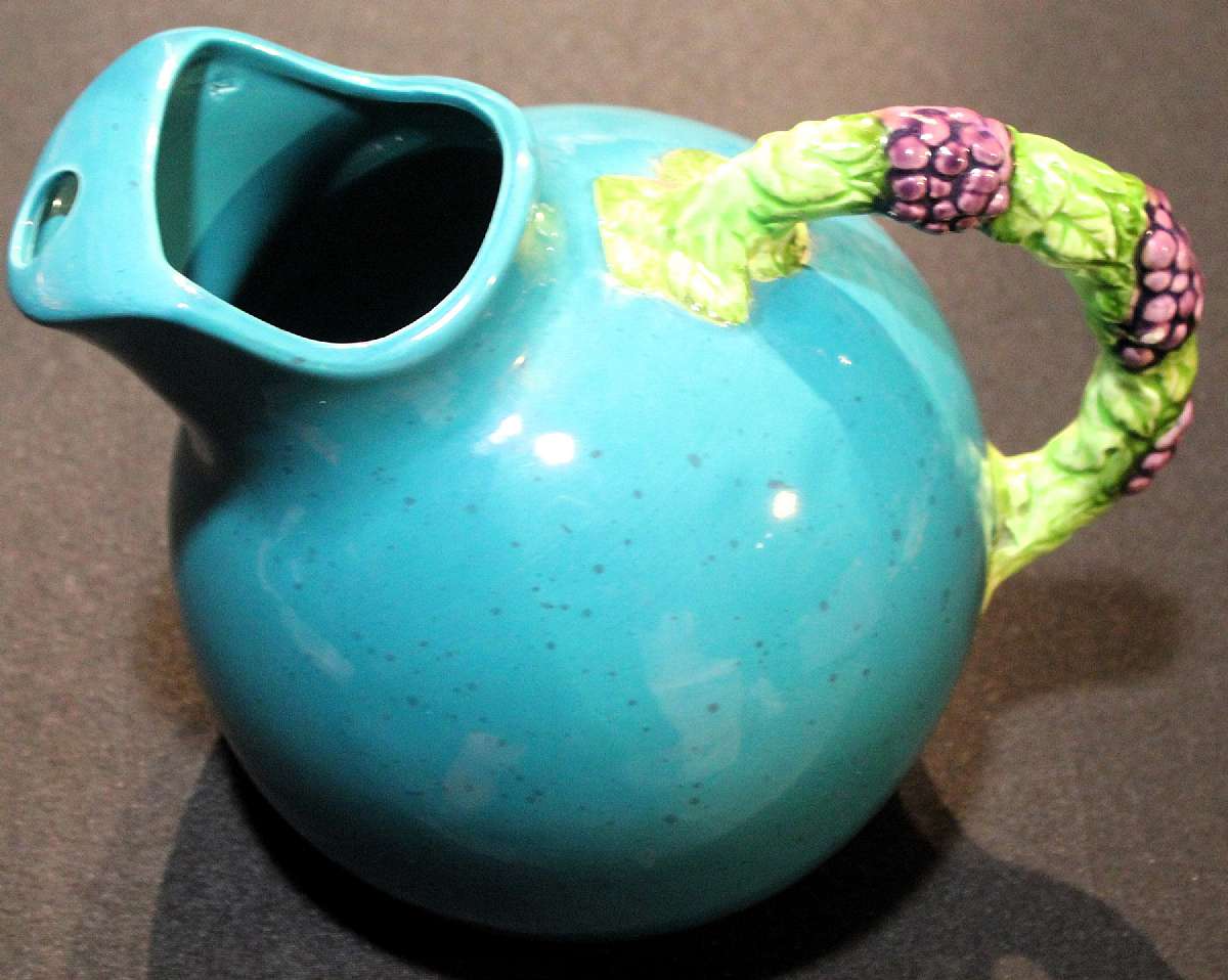 Up for sale is this Dept. 56 Cheryl Johnson Vineyard Tilted Ball Pitcher in excellent condition with no chips or cracks.  Measures approx. 6 1/2"T and holds approx. 64 ounces.  Shipping Excludes: Alaska/Hawaii, US Protectorates, APO/FPO, PO BoxShip