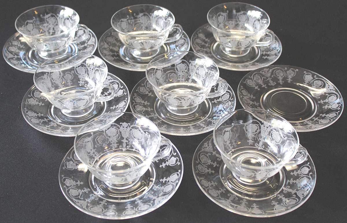 Up for sale are these Antique Fostoria Vernon Clear Set Of Seven Cups & Eight Saucers in great condition with no chips or cracks. The cups measure approx. 2 1/4"T by 3 7/8"W and the plates 5 7/8"W. Circa 1927-1933.Shipping Excludes: Al