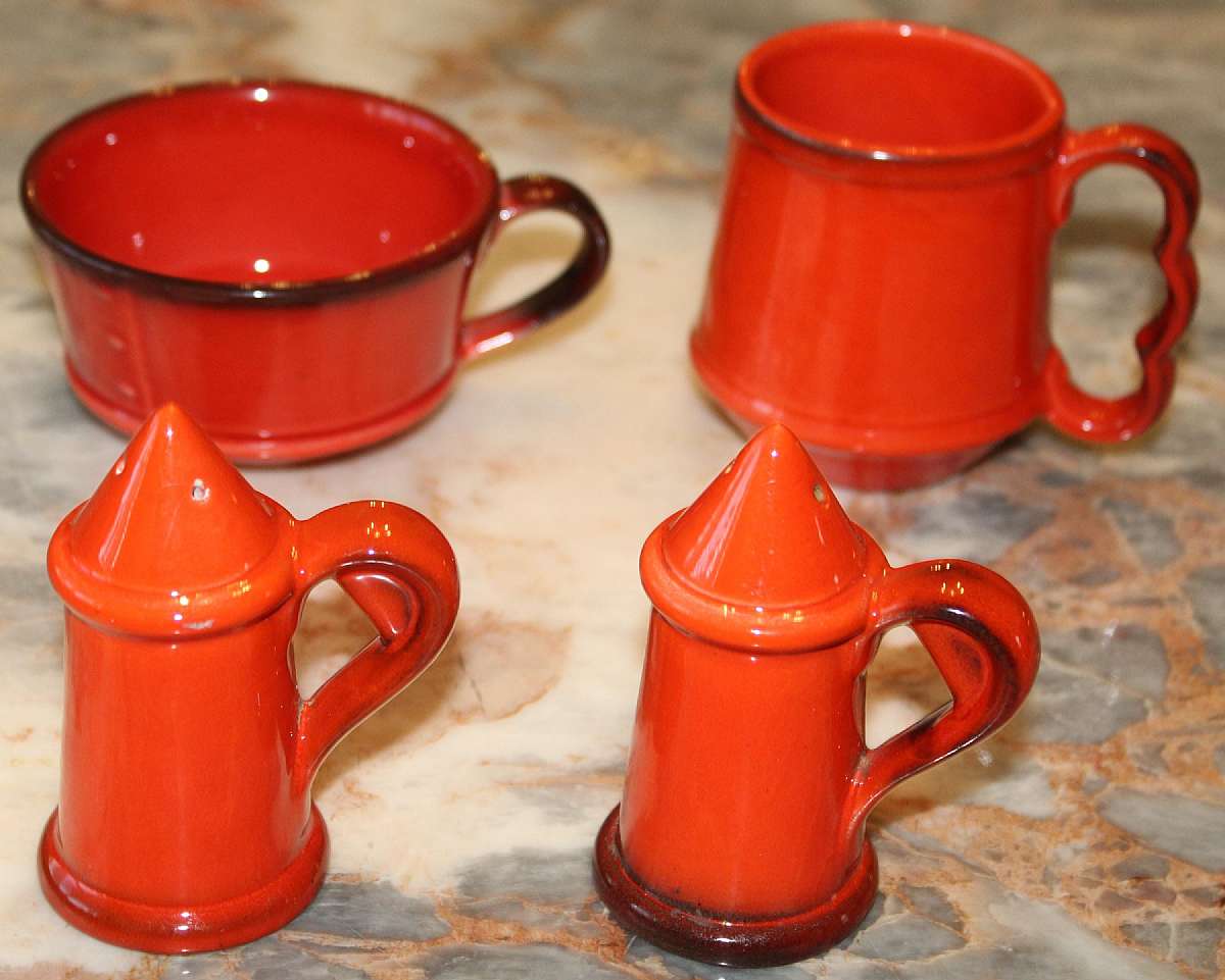 Up for sale are these Metlox Poppytrail Red Rooster Red Salt & Pepper Shakers, one  Mug & one Cup in excellent condition with no chips or cracks. The salt & Pepper shakers measure approx. 3 3/4"T, the mug 3 1/2"T & the cup 2 1/4&